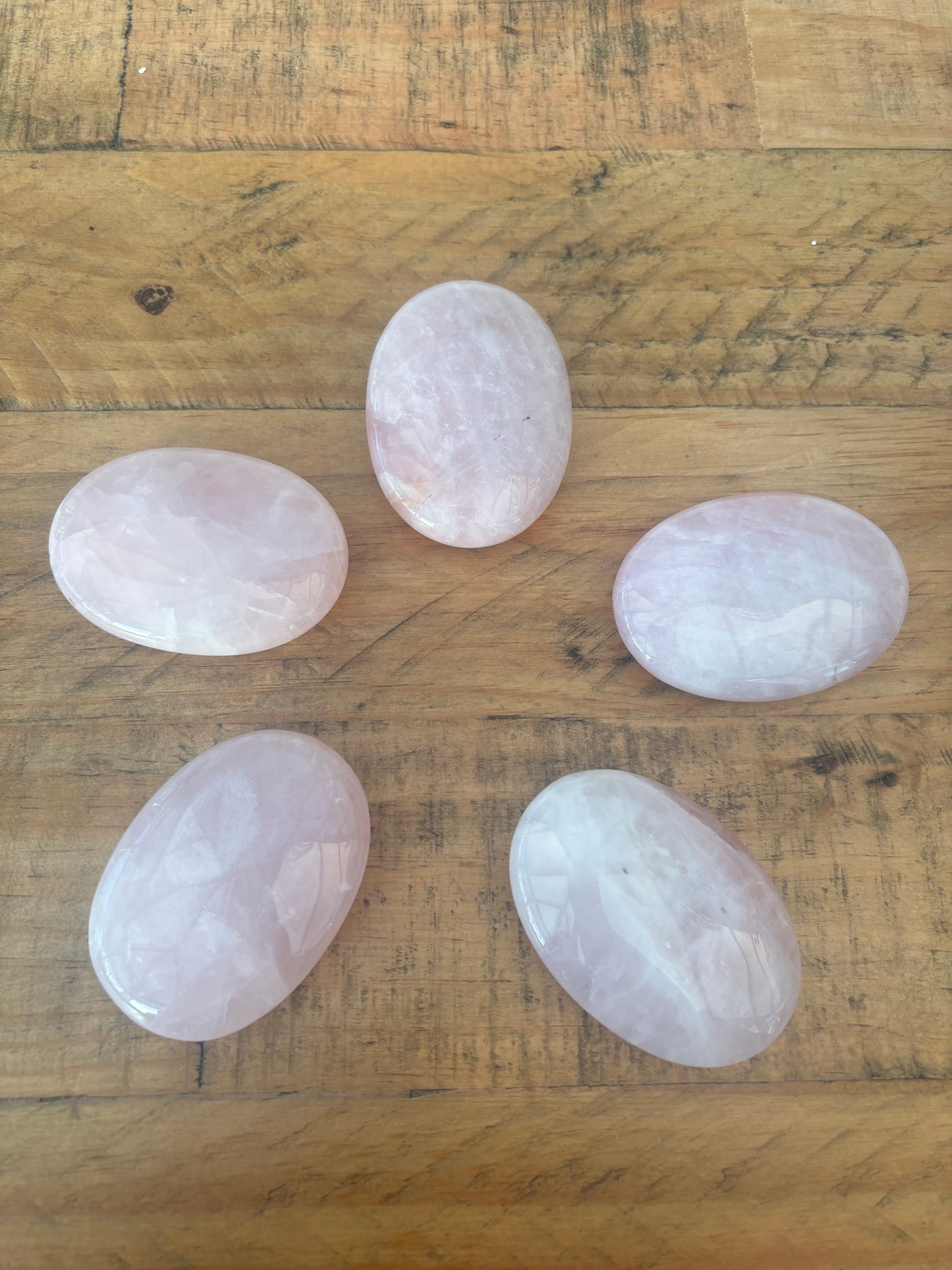 One Rose quartz palm stone